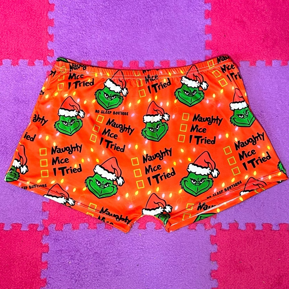 Women’s shorts Christmas Grinch themed shorts.